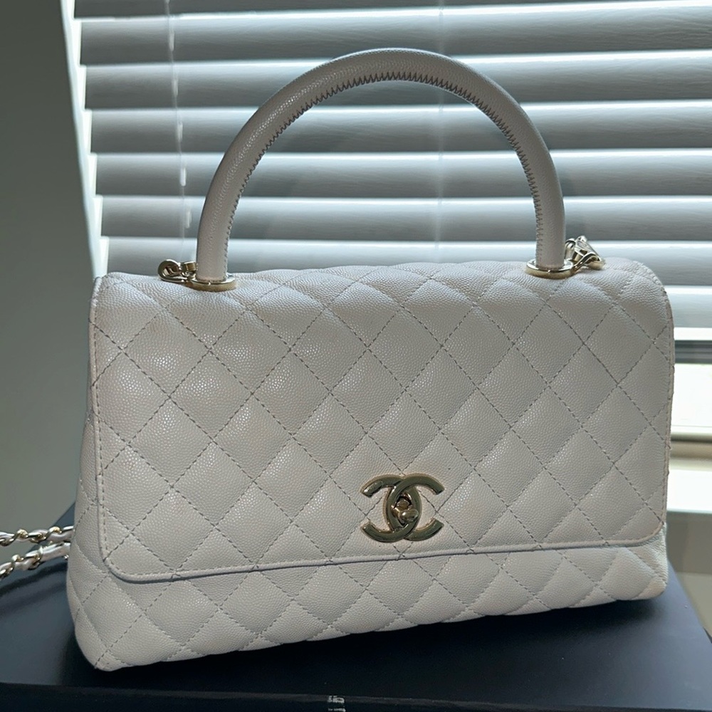 White Chanel bag with handle